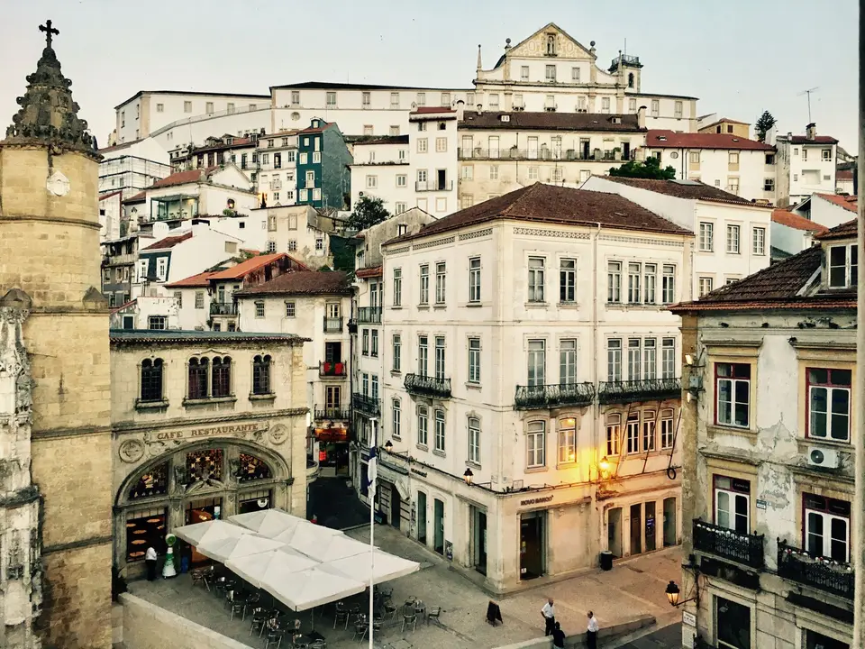 Amazing cityscape of Coimbra with famous historic restaurant and old buildings near  Igreja de Santa Cruz Monastery