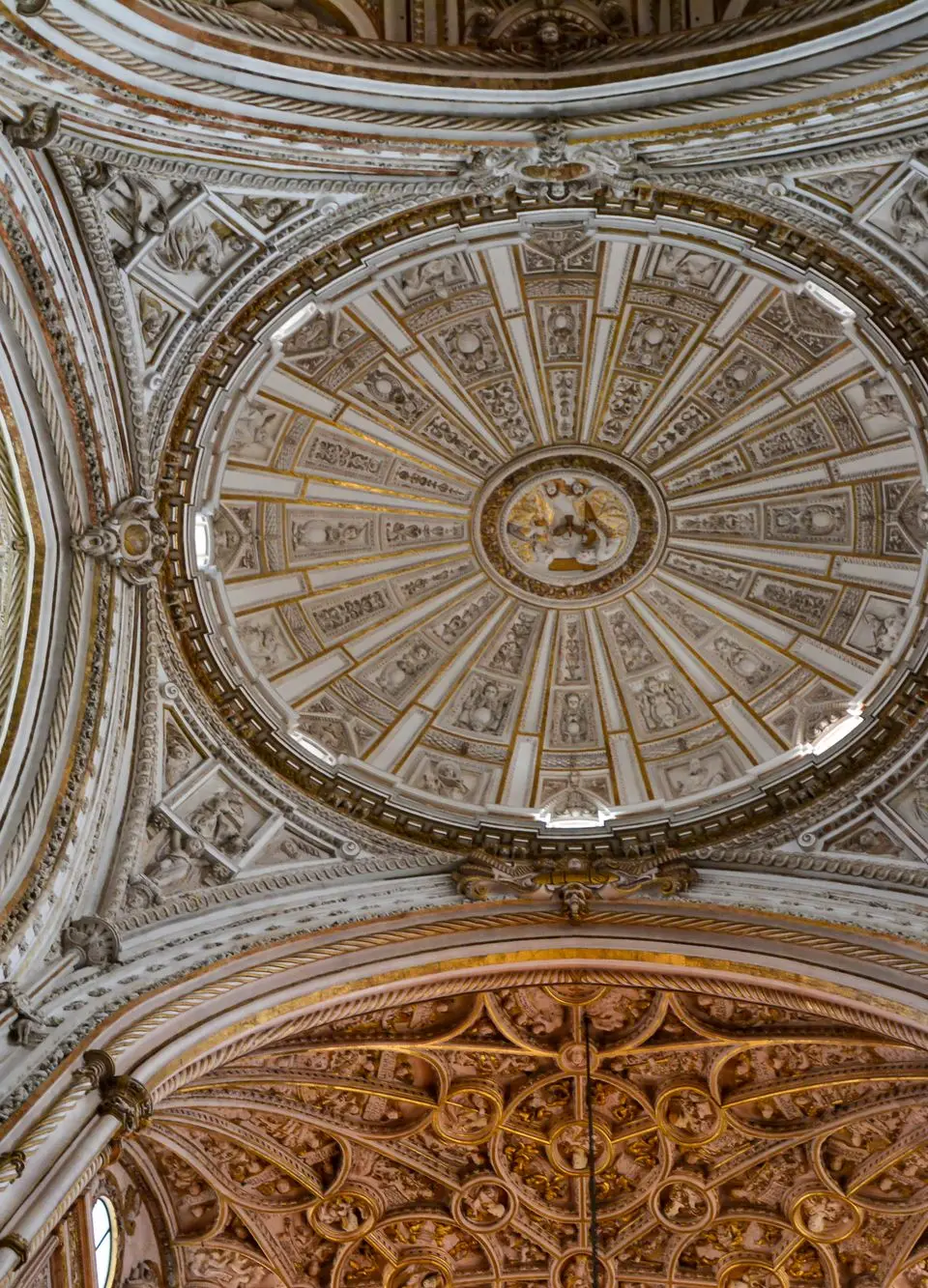 Stunning architectural detail of the Mosque–Cathedral of Córdoba ceiling, showcasing intricate design and craftsmanship.