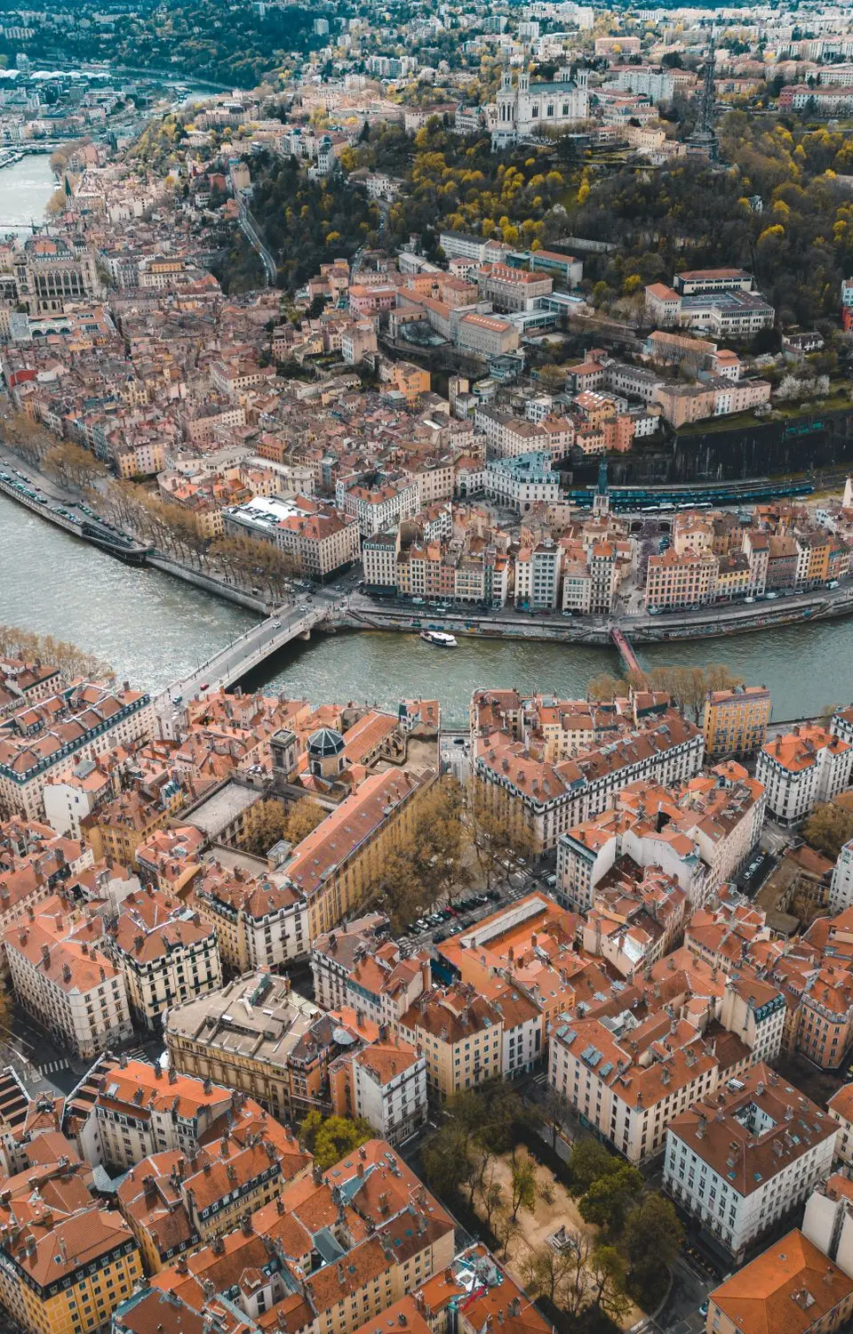 Stunning aerial shot capturing the rivers and historic architecture of Lyon, France.