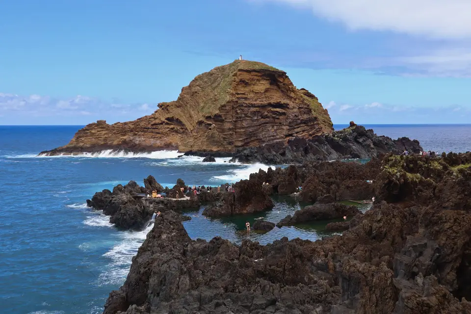 Breathtaking view of natural pools and rocky coastline in Porto Moniz, Madeira.