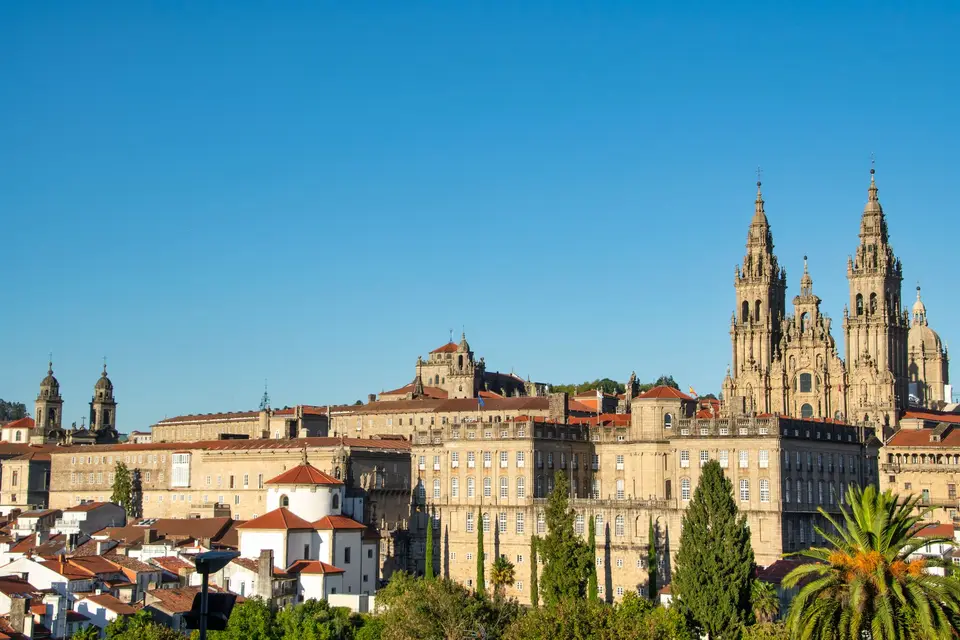 Beautiful view of Santiago de Compostela Cathedral under a clear blue sky during day time.