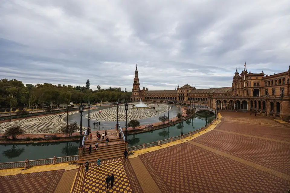A stunning aerial view of Plaza de España in Seville, showcasing its architecture and grandeur.