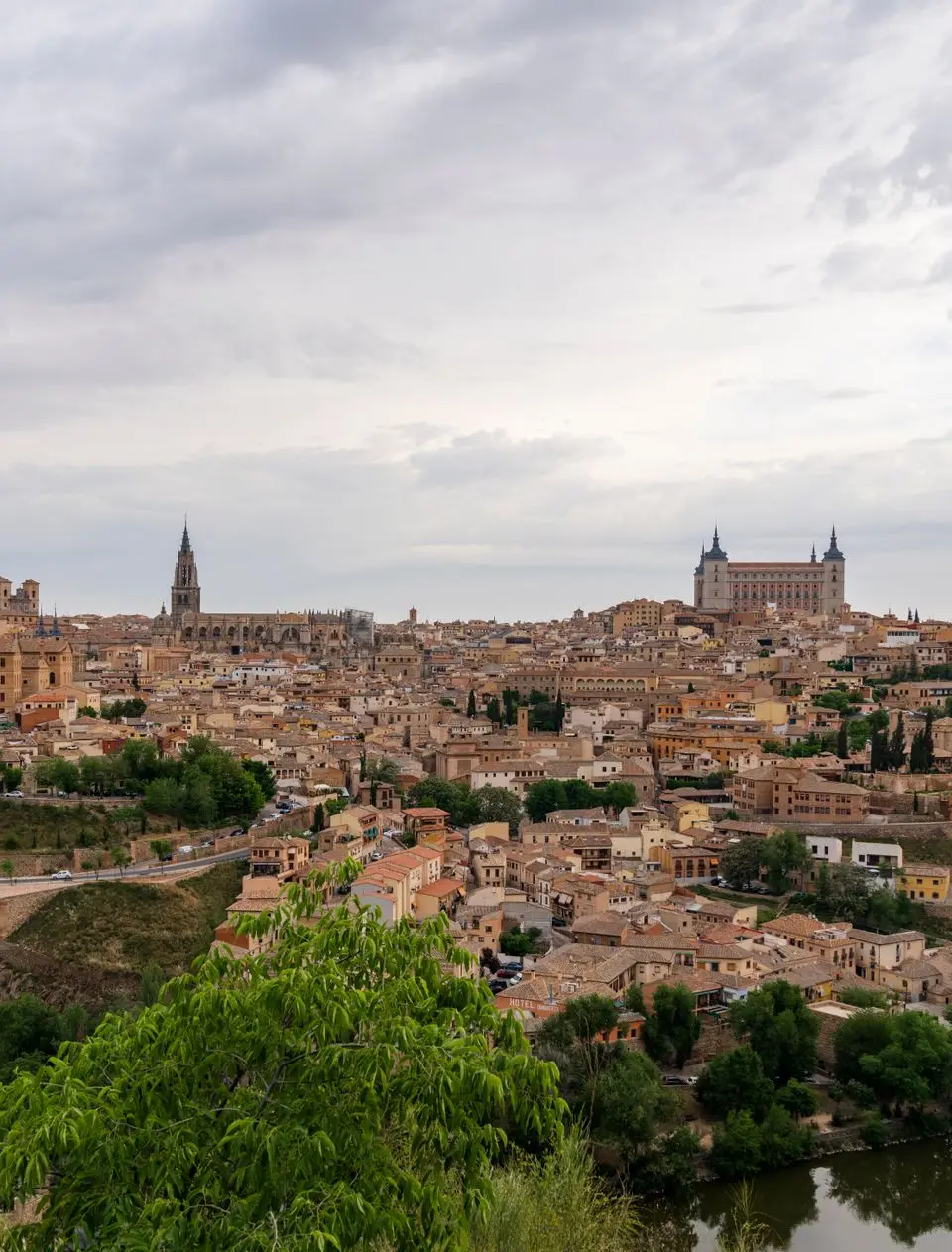 Scenic panoramic view of Toledo, Spain with historic architecture at dusk.